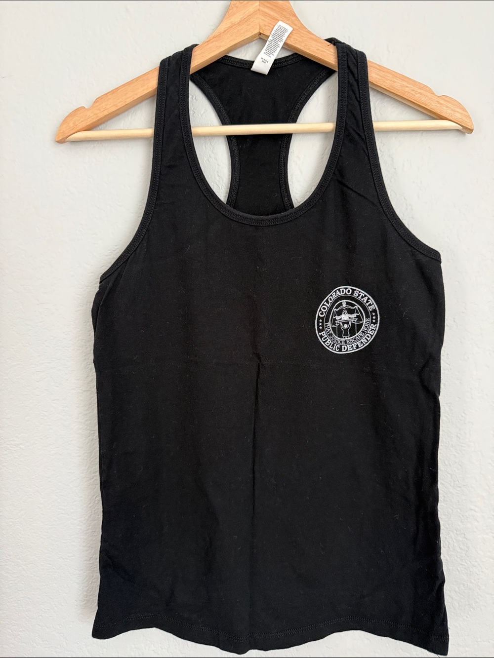 Bella Canvas Black Racerback Tank with White Chest Emblem